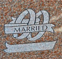 Dogwood blossom shape carving on polished granite