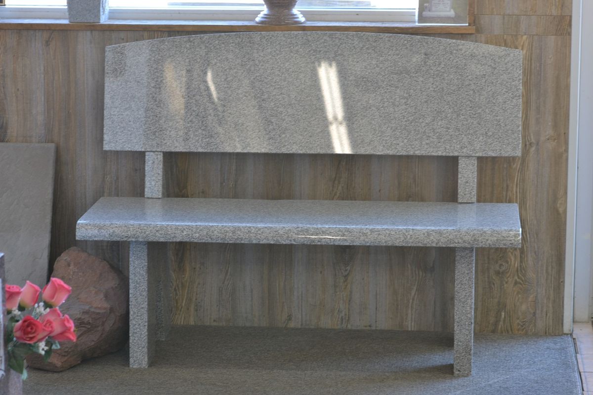 Family granite monument with personalized artwork